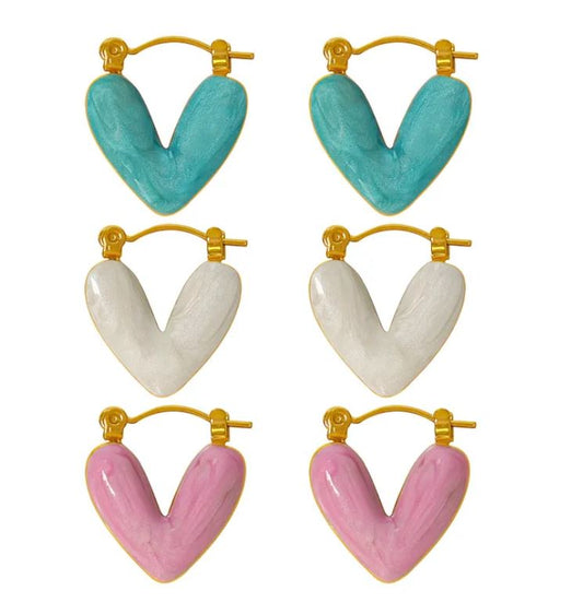 Aretes de corazón Amara blancos