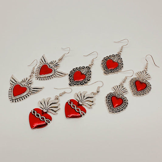 Aretes Sagrado corazón con alas
