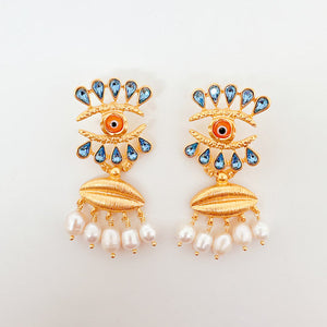 Aretes Anatomy Ojo naraja con perlas Aretes Anatomy Ojo naraja con perlas