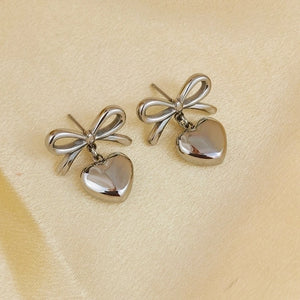 Aretes estilo huggies corazón estrella casual Aretes estilo huggies corazón estrella casual