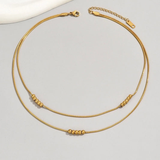 Collar básico mini esferas doble dorado casual
