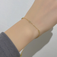 Pulsera minimalista con diamantes rectangulares pequeños