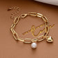 Pulsera cadena con corazón y perla