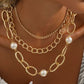 Collar Edna dorado con perla