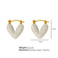 Aretes de corazón Amara blancos