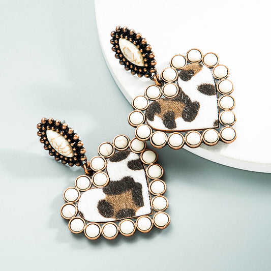 Aretes corazón bohemio blanco