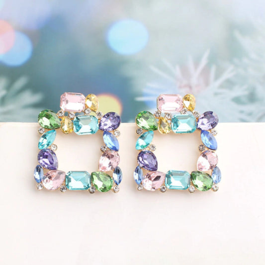 Aretes aqua y lila de cristal cuadrangulares