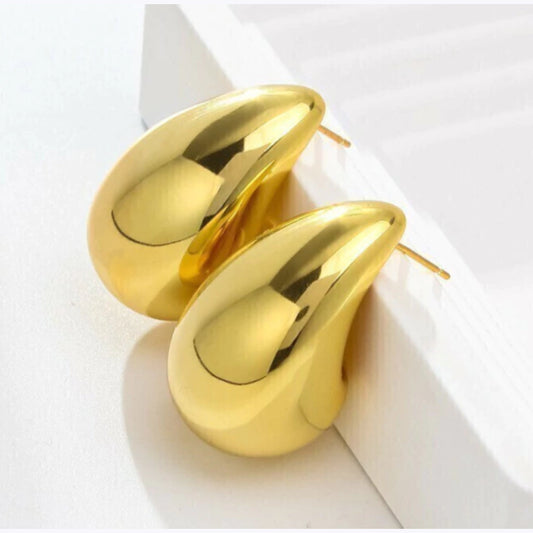 Aretes grandes de gota dorados