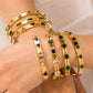 Brazalete dorado con circonias de corazón