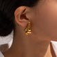 Aretes de gota abierta dorados chapa