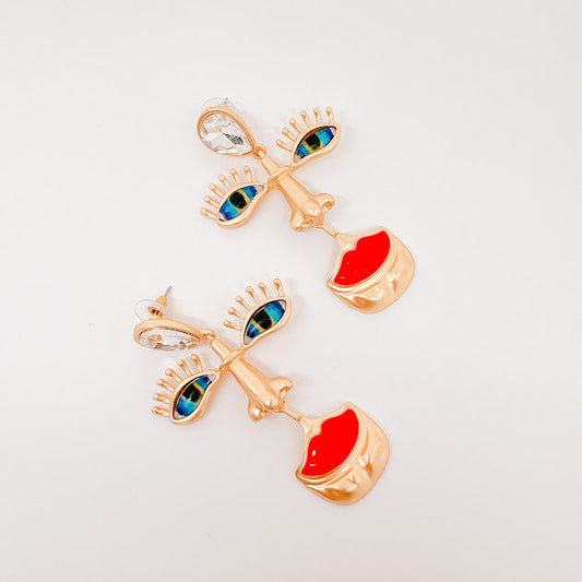 Aretes Rostro misterioso dorados