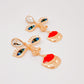 Aretes Rostro misterioso dorados