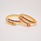 Pulsera Cassandra dorada con rosa
