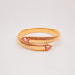 Pulsera Cassandra dorada con rosa