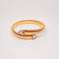 Pulsera Cassandra dorada con blanco