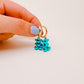 Aretes Teddy metalico azul