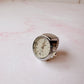 Anillo Reloj eterno glam plateado con blanco
