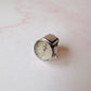 Anillo Reloj eterno glam plateado con blanco