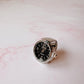 Anillo Reloj eterno glam plateado con negro