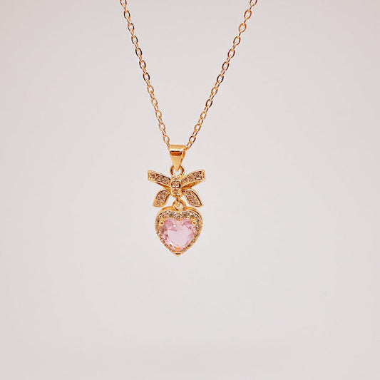 Collar Coquette glam dorado y rosa