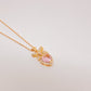 Collar Coquette glam dorado y rosa