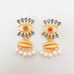 Aretes Anatomy Ojo naraja con perlas