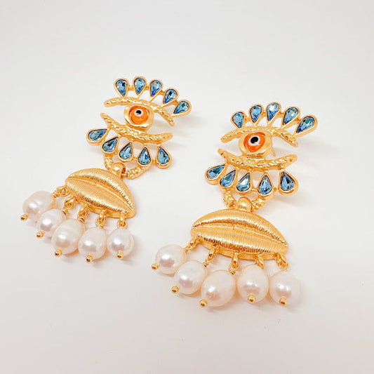 Aretes Anatomy Ojo naraja con perlas