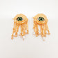 Aretes Anatomy Ojo verde dorados