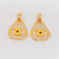 Aretes Anatomy Ojo amarillo con brillos