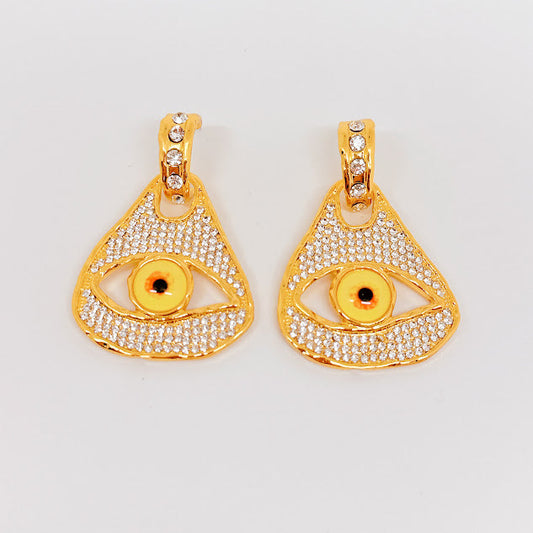 Aretes Anatomy Ojo amarillo con brillos