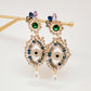 Aretes Anatomy Ojo glam dorados