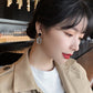 Aretes casuales en tendencia negros