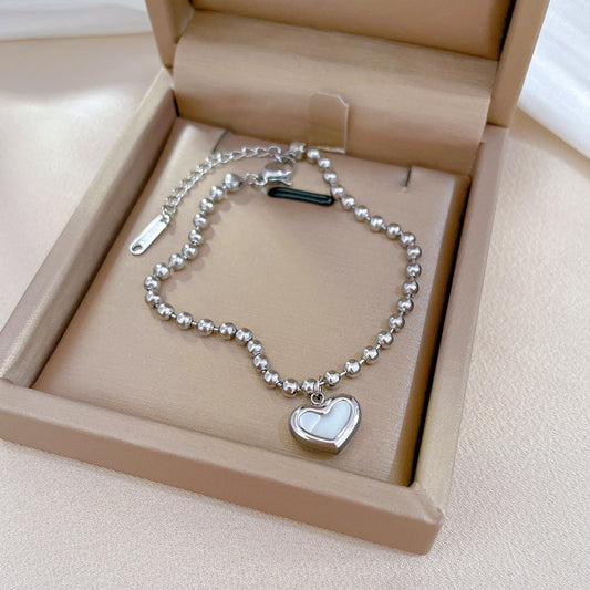 Pulsera en forma de corazón madre perla