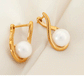 Aretes elegantes con perla en forma de gota