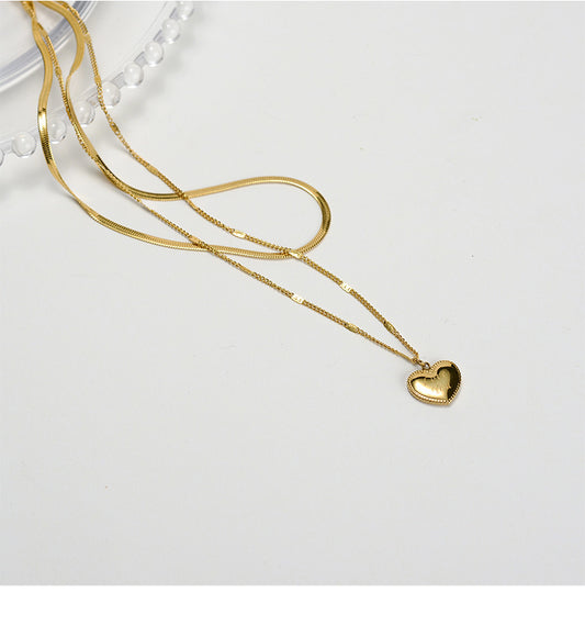 Collar doble con dije de corazón