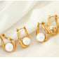 Aretes elegantes con perla en forma de gota