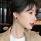 Aretes casuales en tendencia negros