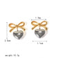 Aretes románticos de corazón con moño