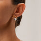 Aretes románticos de corazón con moño