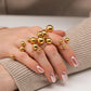 Anillo esferas varias elegante básico