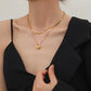 Collar doble con dije de corazón