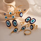Aretes de ojos protectores diseños varios