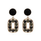 Aretes casuales en tendencia negros