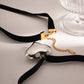 Collar chocker corazón lazo negro