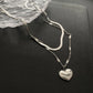 Collar doble con dije de corazón