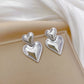 Aretes estilo huggies corazón estrella casual