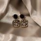 Aretes casuales en tendencia negros