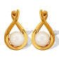 Aretes elegantes con perla en forma de gota