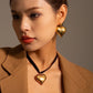 Collar chocker corazón lazo negro