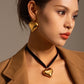 Collar chocker corazón lazo negro